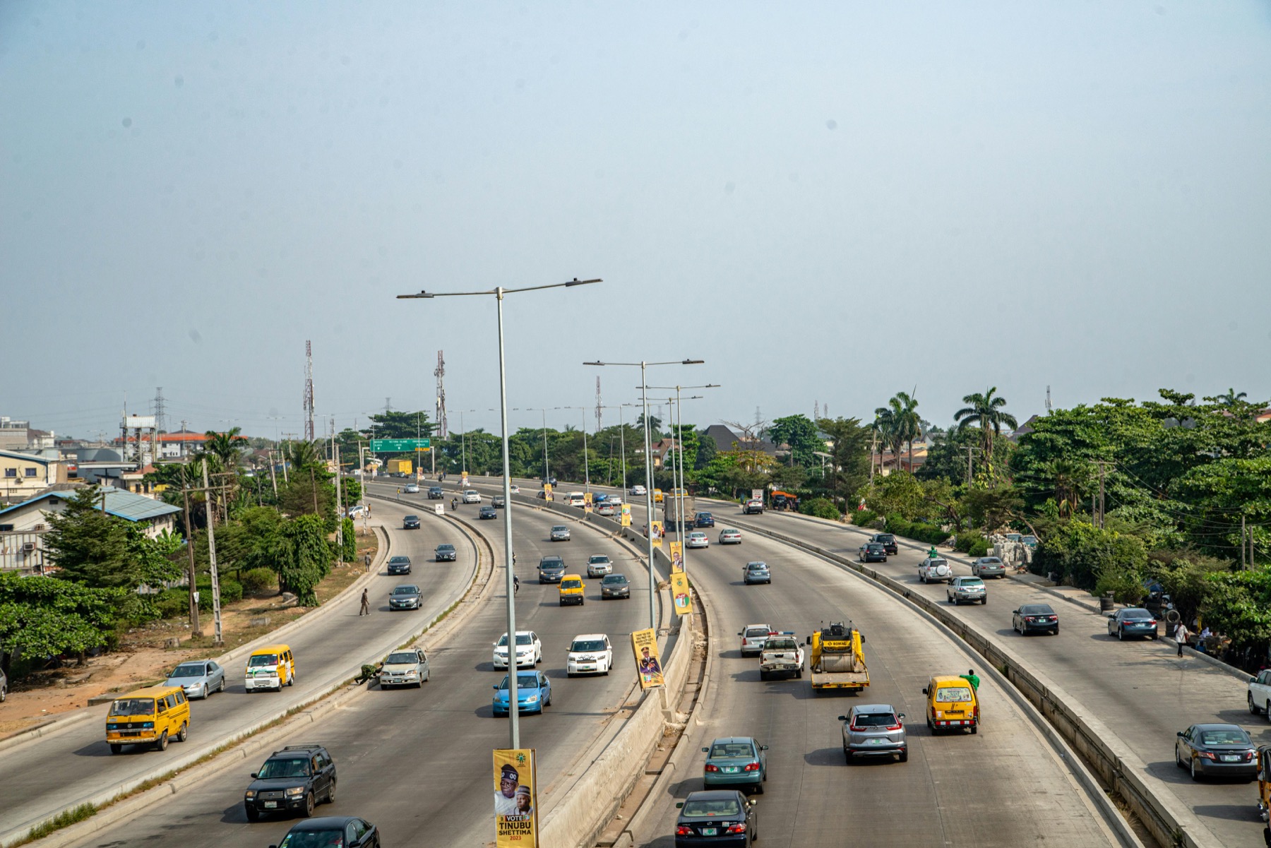 Traffic moving along a major road in Lagos